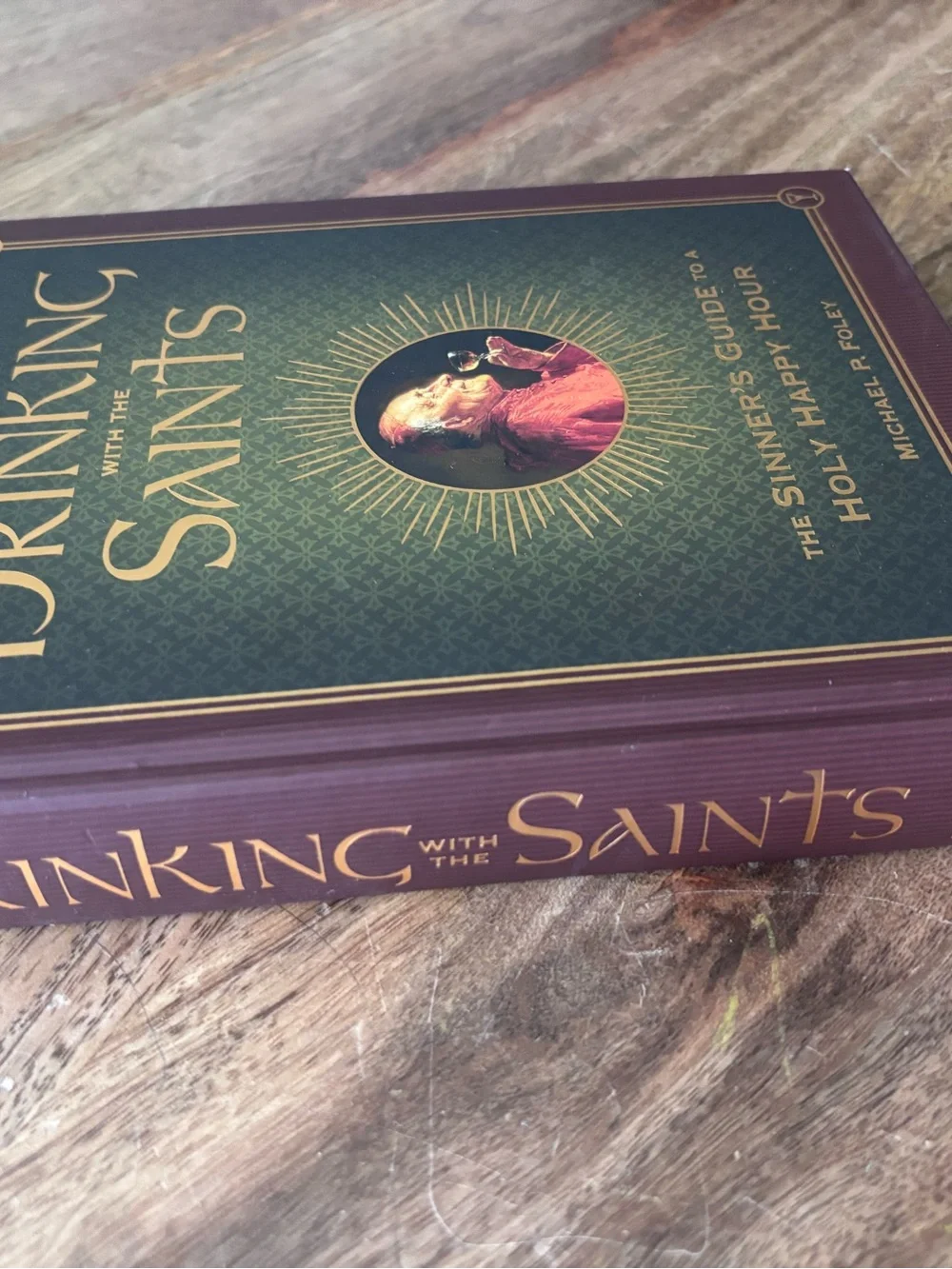 Drinking with the Saints Hardcover Book by - Green and Burgundy